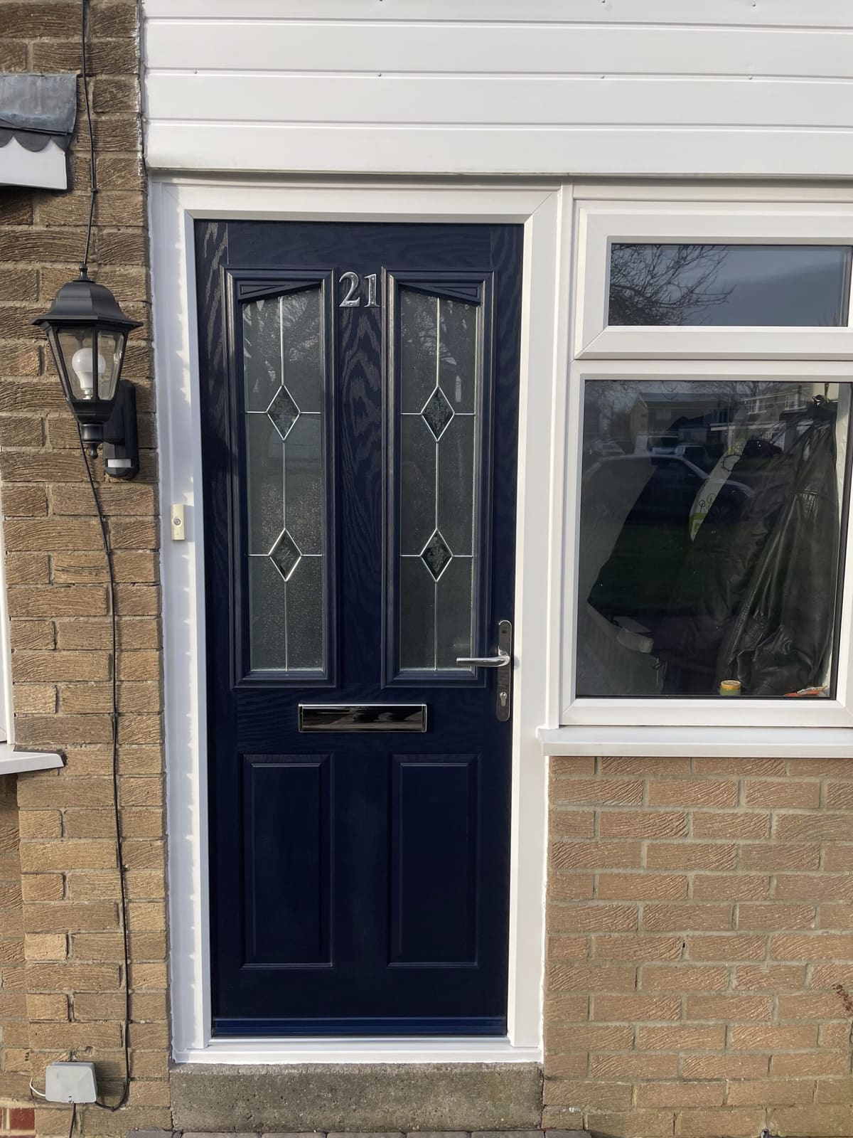 Navy blue composite front door with leaded glass fitted in Newcastle